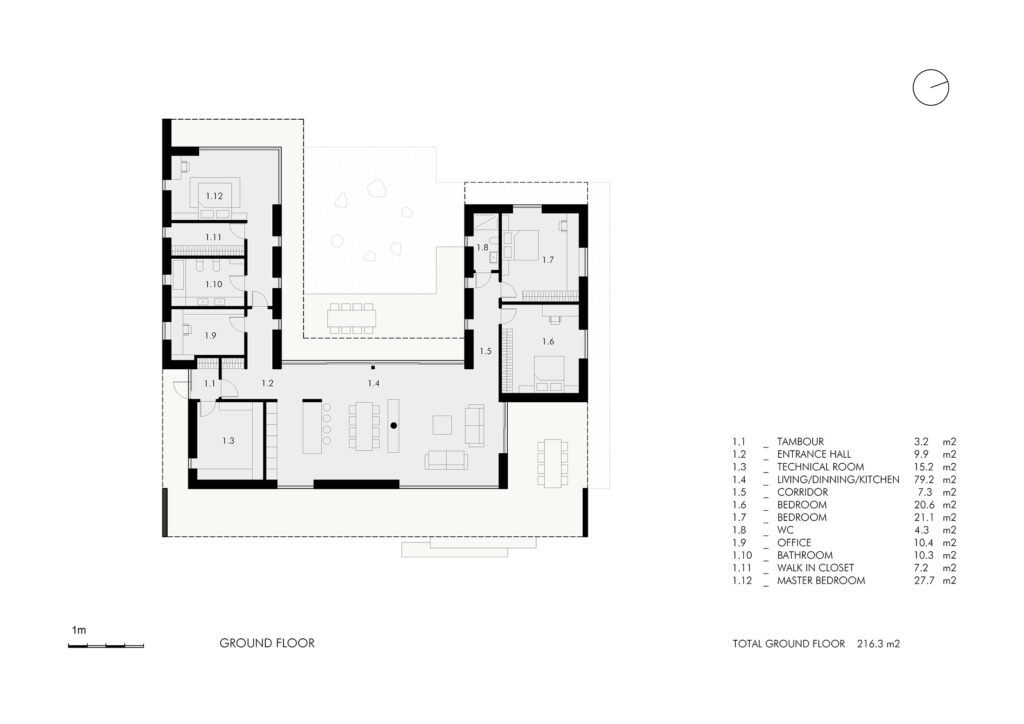 Floor plan of Villa AJ showing U-shaped layout with central courtyard, open-plan living area and private bedroom zones, designed by NG Architects